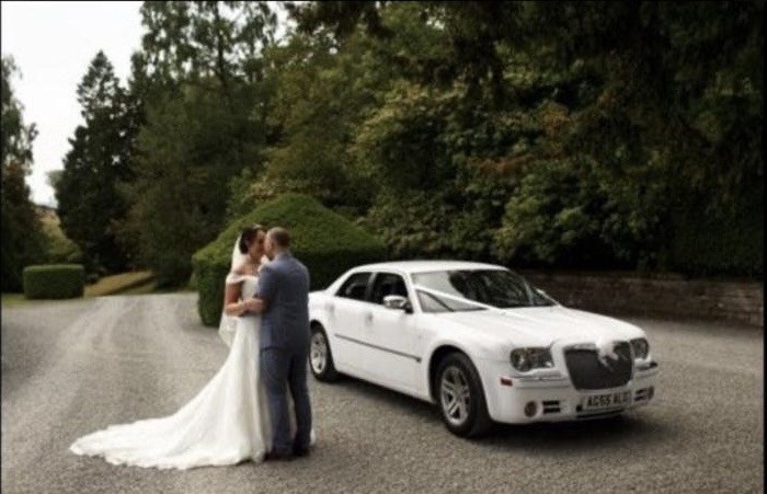 Wedding car hire in Stockport — white Chrysler 300C Baby Bentley